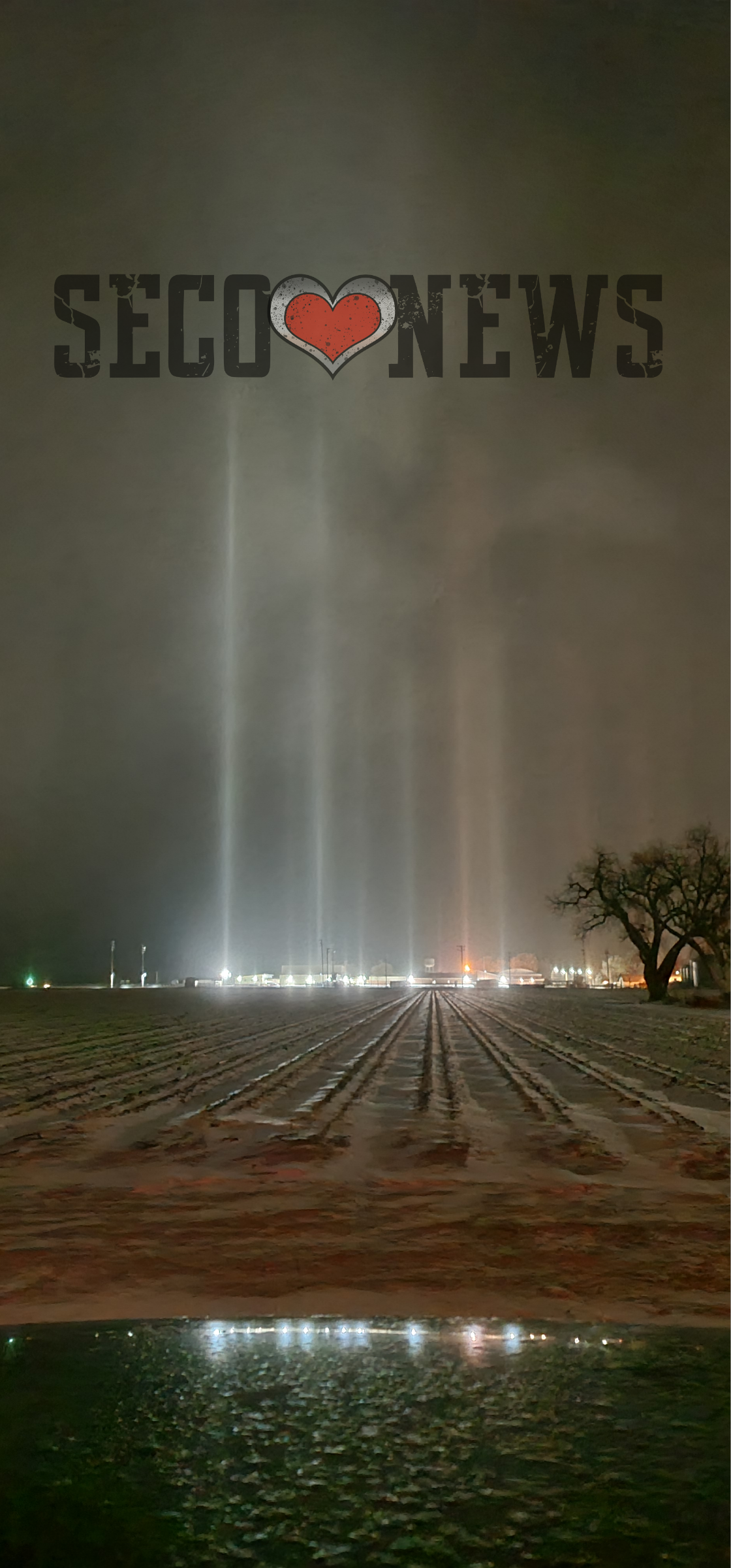 SECO News Logo with Swink Colorado Light Pillars SECO News seconews.org